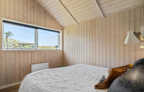 a bedroom with a bed and a window at A Stunning Home In Haderslev With 3 Bedrooms And Wifi in Haderslev