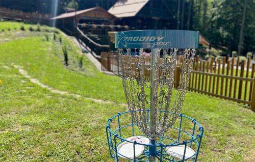 a frisbee golf goal in the middle of a field at Beautiful Home In Klenovnik With Sauna in Klenovnik