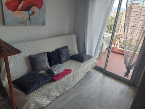 Postel nebo postele na pokoji v ubytování AJACCiO VUE MER ET GOLFE