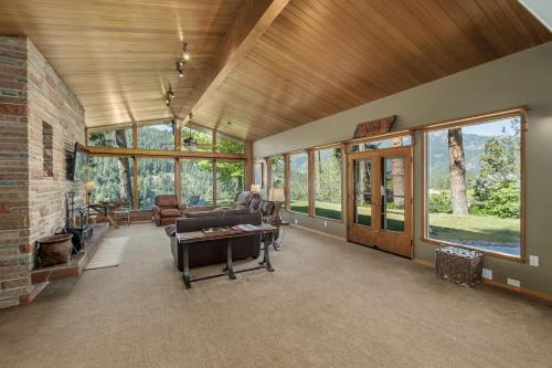 a living room with a couch and a table at River Heights Home cabin in Leavenworth