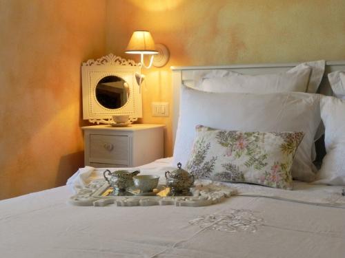 Agriturismo Sugheretelloにあるベッド