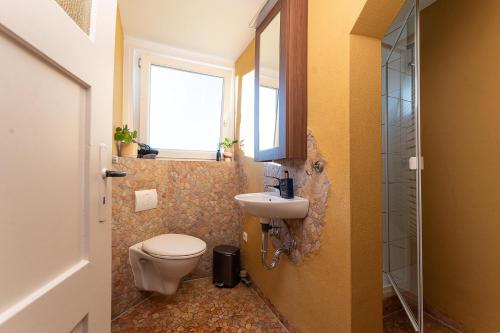 Ένα μπάνιο στο Ferienwohnung Hahne