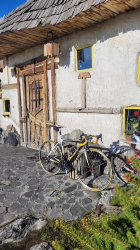 a bike parked in front of a building at Hotel Bashinjaghyan in Sevan