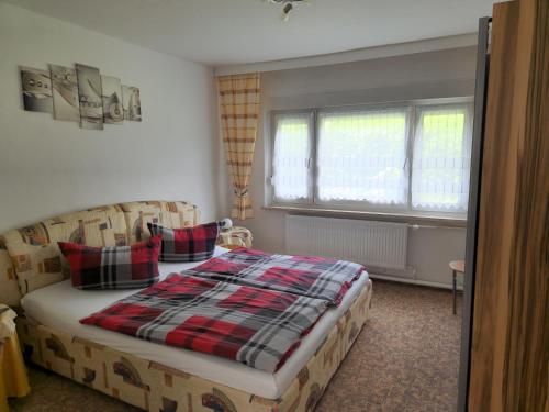 Postel nebo postele na pokoji v ubytování Ferienwohnung Lux