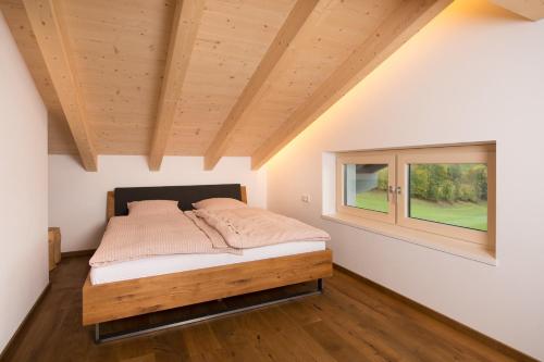 Posteľ alebo postele v izbe v ubytovaní Gasthof Hubertus