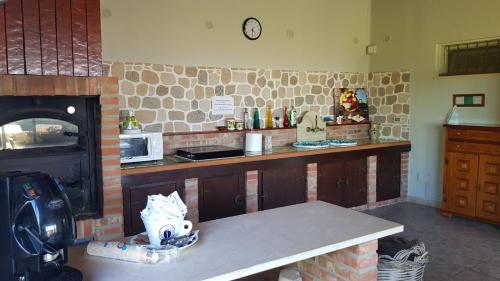 Kuchyň nebo kuchyňský kout v ubytování Bed House Floristella