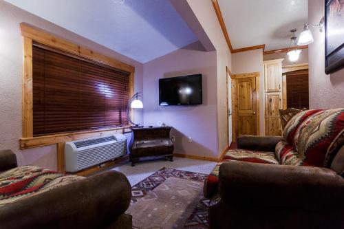 TV o dispositivi per l'intrattenimento presso Desert Rose Resort & Cabins