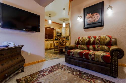 TV o dispositivi per l'intrattenimento presso Desert Rose Resort & Cabins