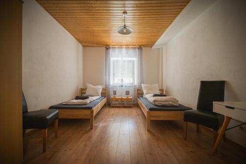 Postel nebo postele na pokoji v ubytování Ferienhaus am Grünen Bug
