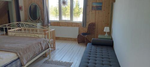 Postel nebo postele na pokoji v ubytování House with lake view swedish lapland