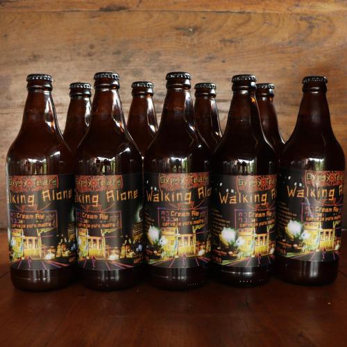 a group of bottles of beer sitting on a table at Cachoeiras Pé da Serra in São João Batista do Glória