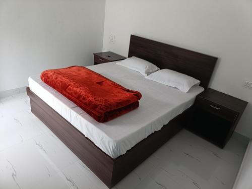 Postel nebo postele na pokoji v ubytování Hotel pushpdeep