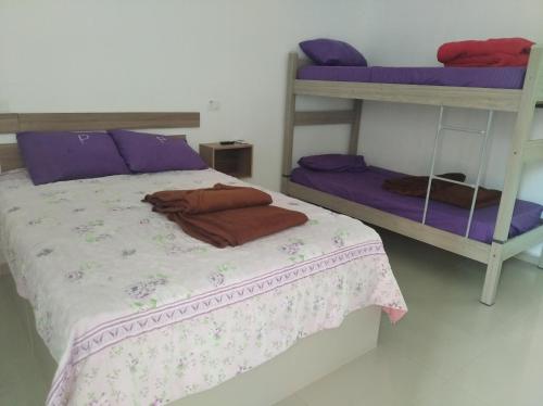 Ένα ή περισσότερα κρεβάτια σε δωμάτιο στο Pesqueiro Restaurante e Pousada Pingo de Ouro