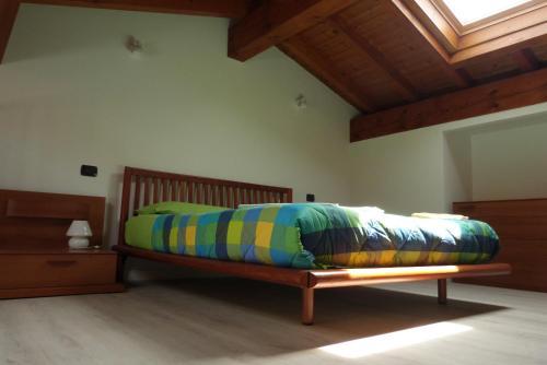 Postel nebo postele na pokoji v ubytování Giardino tra i laghi