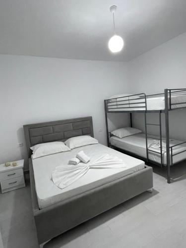 Postel nebo postele na pokoji v ubytování Vila Mili