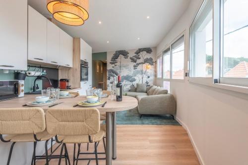 Suites Kerlarros Clim et Parking face Gare et Port