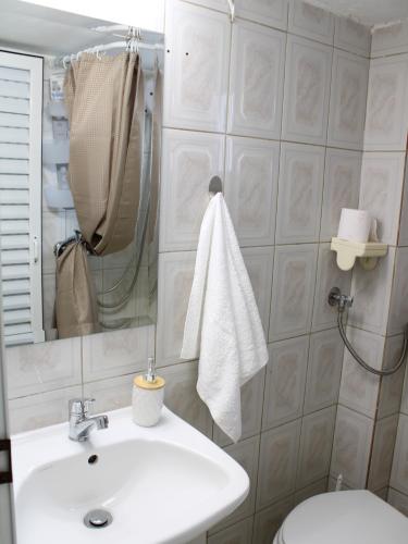 Ένα μπάνιο στο Sunshine apartments by the Sea