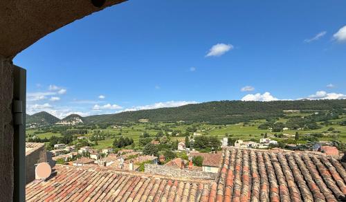 a view of a town from a roof at Spectacular Views - Sablet in Sablet