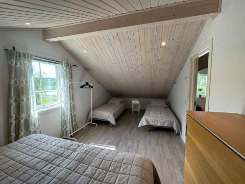 Postel nebo postele na pokoji v ubytování Fjällbacka Premium Living - Wonderful Location