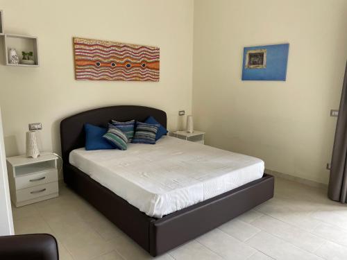 Postel nebo postele na pokoji v ubytování B&B Cafe' Fausu
