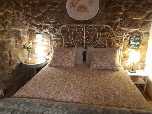 Giường trong phòng chung tại Quinta da Maínha - Charming Houses