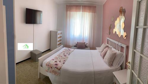 a bedroom with a large bed in a room at Casa Lavi Rapallo in Rapallo