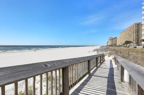 a boardwalk leading to the beach and condos at Seaside Beach 2103- Ground level beachside in Orange Beach