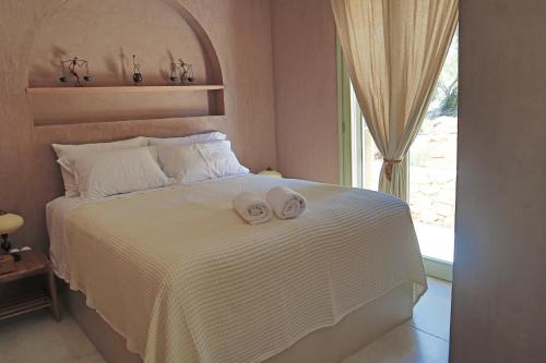 Katil atau katil-katil dalam bilik di Jasmine Villa