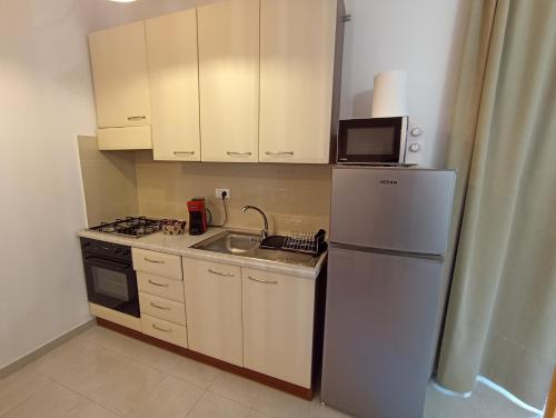 Kuchyň nebo kuchyňský kout v ubytování B&B Casa Gabriele