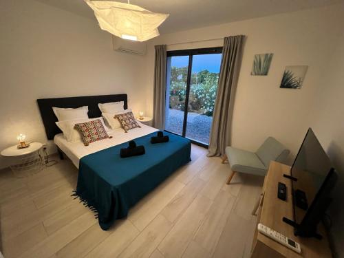 Posteľ alebo postele v izbe v ubytovaní Cala Rossa, Pinarello, Saint Cyprien - La Villa D'Alice
