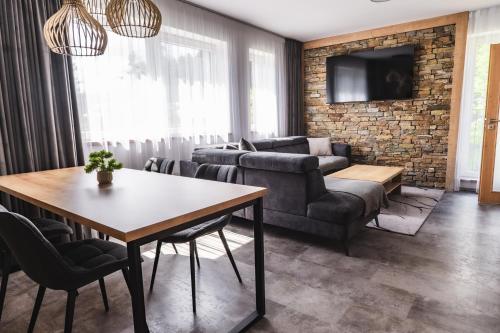 TV a/nebo společenská místnost v ubytování Luxusní Apartmán Domovjanka - SKALKA FAMILY