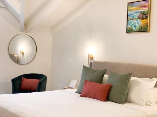 Ένα ή περισσότερα κρεβάτια σε δωμάτιο στο Rouchotas Apartments