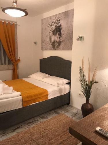 a bedroom with a bed in a room at al'çatı flaneur in Çeşme