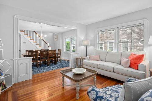 a living room with a couch and a table at 388 Main Street Chatham Cape Cod - - The Priscilla House in Chatham