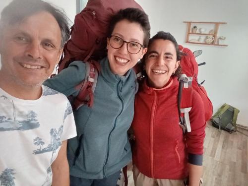 a group of three people posing for a picture at Hostal Maria Casa in La Serena