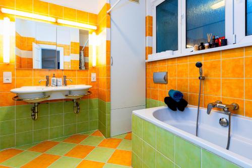 A bathroom at Moonlight Deluxe Suite