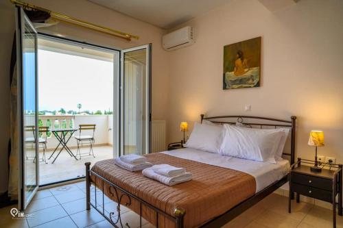 Katil atau katil-katil dalam bilik di Luxury Villa King George