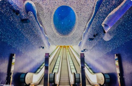 a view from the inside of a train station with escalators at Napoli Centro Casa Vacanza in Naples