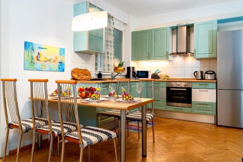 A kitchen or kitchenette at Moonlight Deluxe Suite