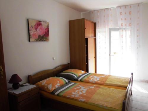 Posteľ alebo postele v izbe v ubytovaní Ferienhaus San Marino