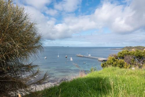 a view of a harbor with boats in the water at Pebble Views by Property Mums in Flinders