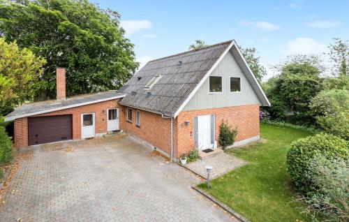 an aerial view of a house with a garage at Lovely Apartment In Erslev With Wifi in Erslev