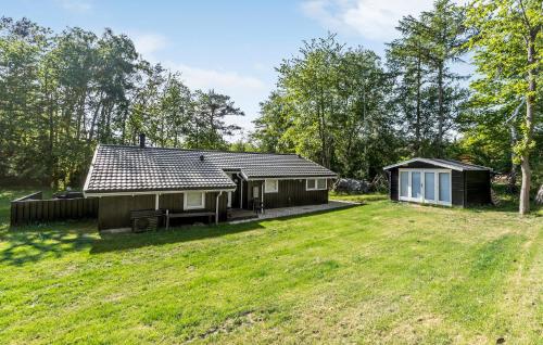 a house with a large yard in front of it at 4 Bedroom Beautiful Home In Gilleleje in Gilleleje