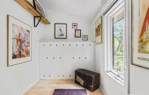 a room with white walls and a window at Lovely Home In Strøby With Wifi in Strøby