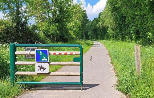 a sign on the side of a dirt road at Cozy Home In Saint-Pierre-En-Auge in Sainte-Marguerite-de-Viette