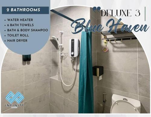 a magazine cover of a bathroom with a shower at Roxy Sematan Beach Townhouse Deluxe 3 ,5 & 6 in Sematan
