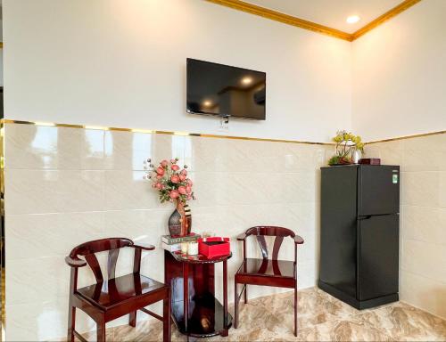 TV a/nebo společenská místnost v ubytování Gia An Hotel-Cần thơ