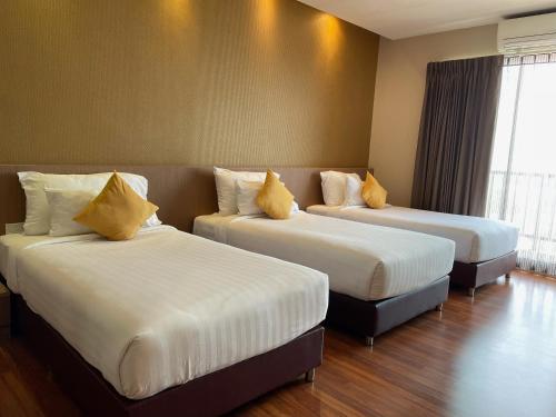 Katil atau katil-katil dalam bilik di Tonaoi Grand Hotel