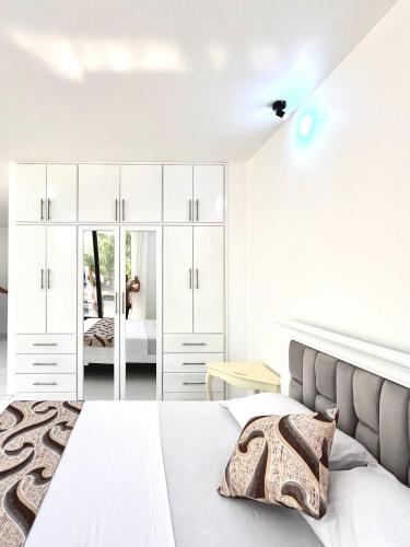 Ein Bett oder Betten in einem Zimmer der Unterkunft HOTEL SUEÑOS BEACH