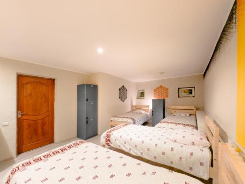Katil atau katil-katil dalam bilik di Wanderlust hostel Riverside